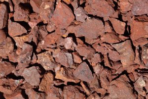 A,Macro,Photo,Of,Red,Crushed,Iron,Ore.