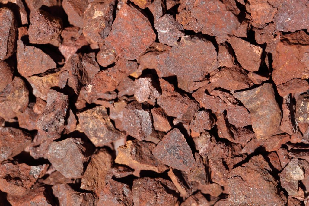 A,Macro,Photo,Of,Red,Crushed,Iron,Ore.