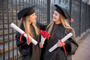 medium-view-friends-with-bouquet-roses-graduation_23-2148232760